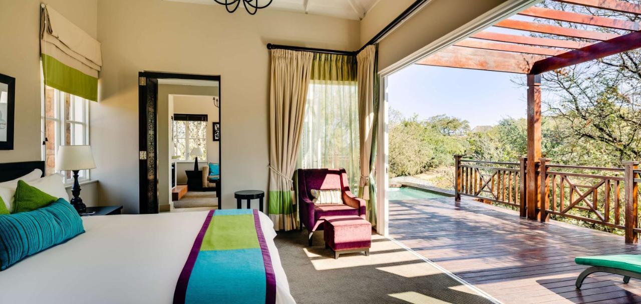 Mount Grace Hotel & Spa มากาลีสเบิร์ก ภายนอก รูปภาพ A bedroom at the resort